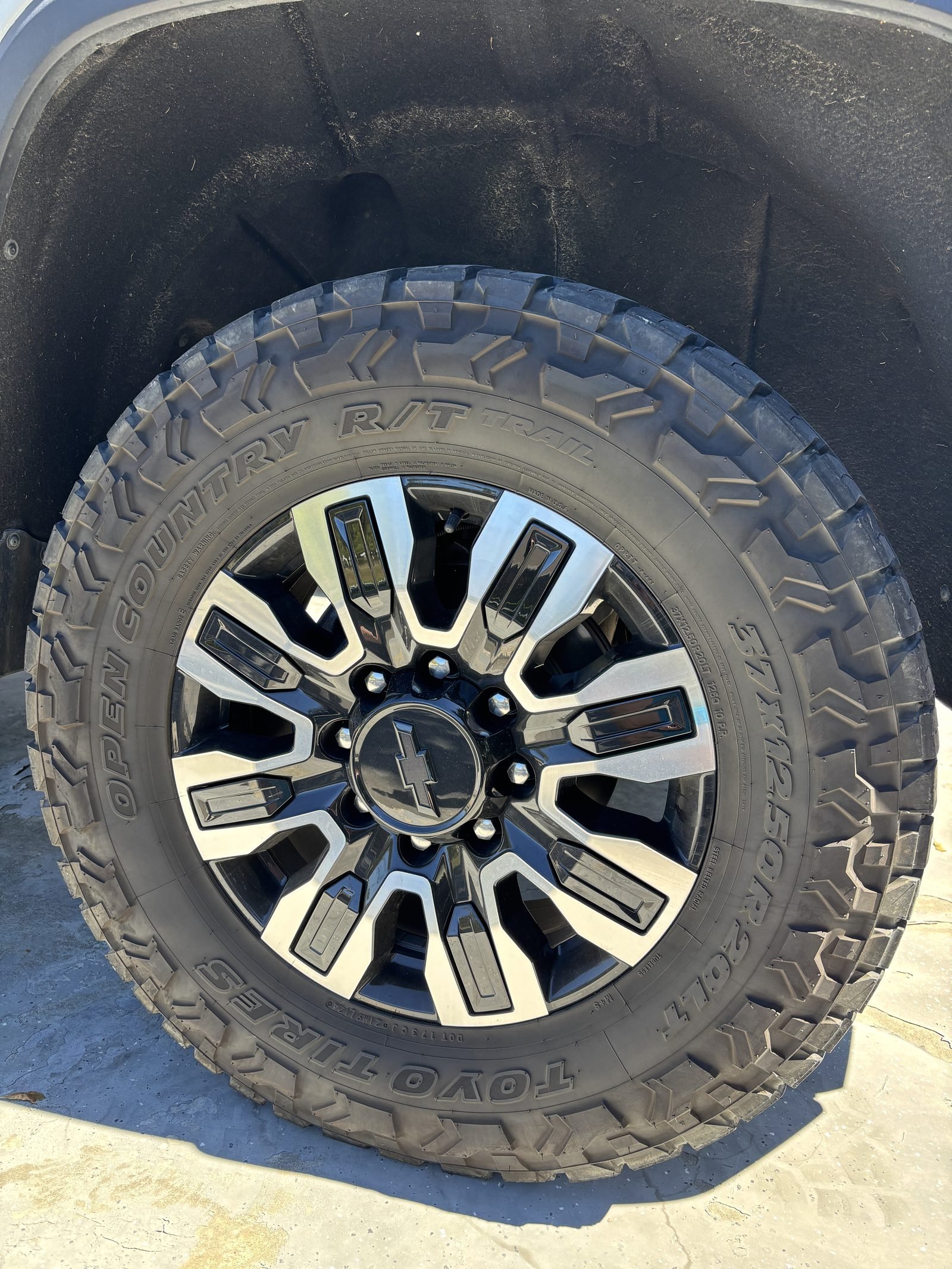 Close-up of Toyo Open Country R/T Trail 37x12.50R20 tire on a 2021 Silverado 2500HD